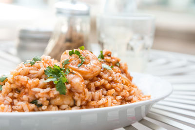 Close-up of rice served in plate on table