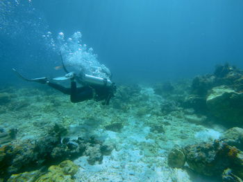 Man swimming in sea