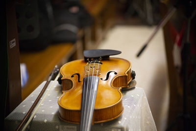 Close-up of violin on table