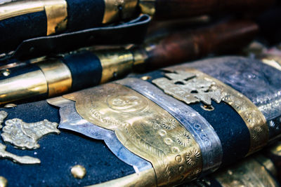 Close-up of old machine on table