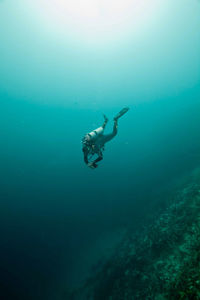 Scuba diver swimming underwater