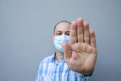 Portrait of man against white background