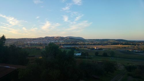 Aerial view of city against sky