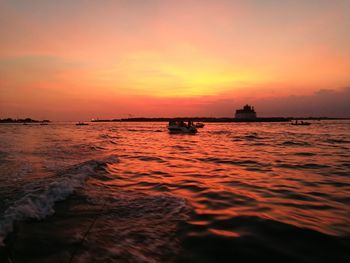 Scenic view of sea at sunset