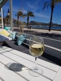 Close-up of wine glasses on table