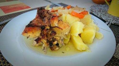 Close-up of served food in plate