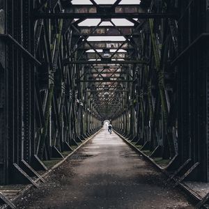 Woman walking on road