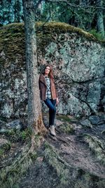 Portrait of young woman in forest