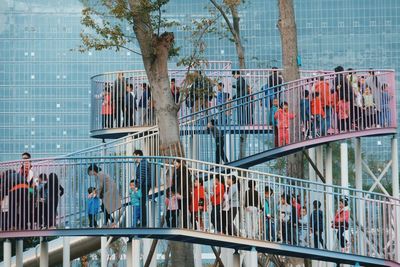 People walking on modern office building