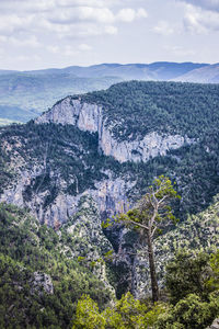 Scenic view of rocky mountains against sky