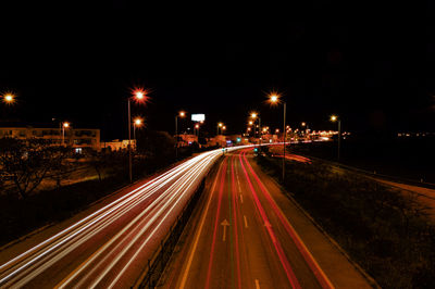 Light trails on road at night