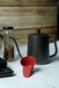 Close-up of coffee cup on table