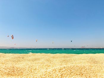 Scenic view of sea against blue sky