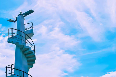 Low angle view of staircase against sky