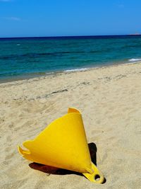 Buoy on the beach on a day at sea. 