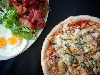 High angle view of pizza served in plate