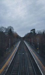 Railroad tracks against sky