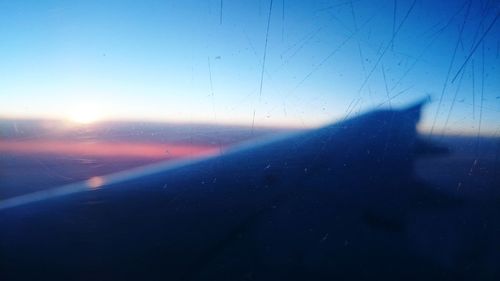 Scenic view of sea seen through airplane window