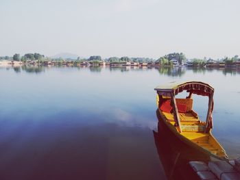 Boat in sea against clear sky