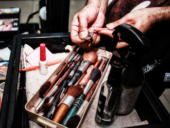 Close-up of man working on table