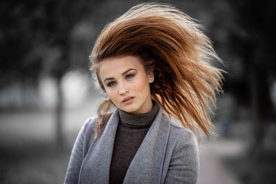 Portrait of young woman in winter