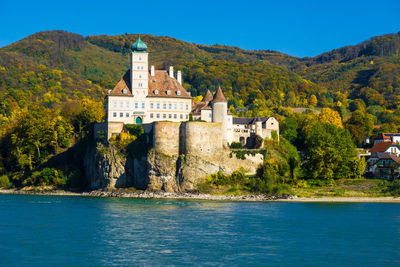 Danube river against castle and mountains