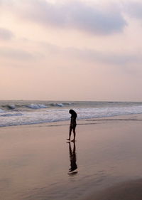 Scenic view of sea at sunset