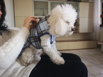 Woman with dog at home