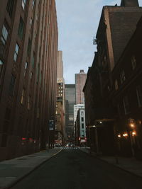 Street in city against sky