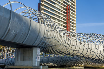 Low angle view of factory against sky