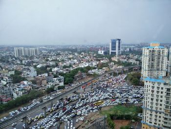 High angle view of street amidst buildings in city