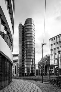 Low angle view of modern buildings against sky