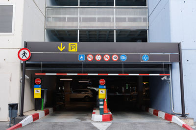 Entrance to a covered parking lot set up on several floors.