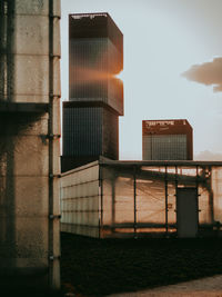 Low angle view of building against sky during sunset