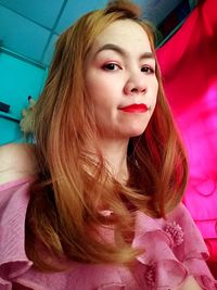 Portrait of beautiful woman at home