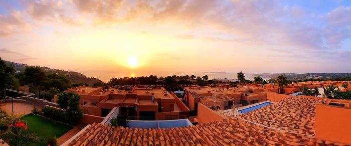 High angle view of townscape against sky during sunset