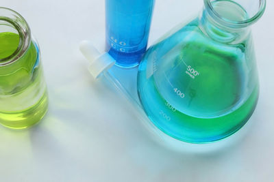 High angle view of glass jar on table