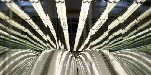 Low angle view of illuminated ceiling