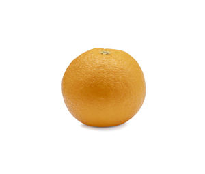 Close-up of orange apple against white background