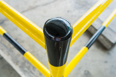 High angle view of yellow railing