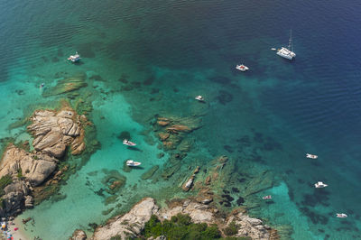 High angle view of boats on sea shore