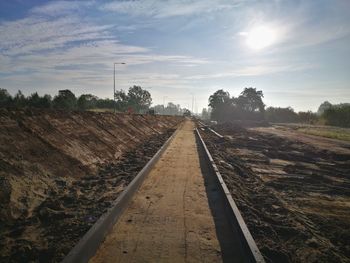 Railroad tracks against sky