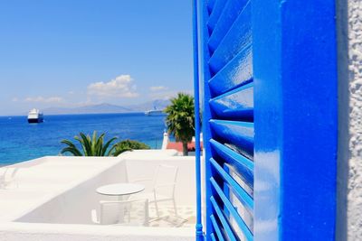 Scenic view of calm sea against blue sky