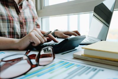 Man using laptop on table