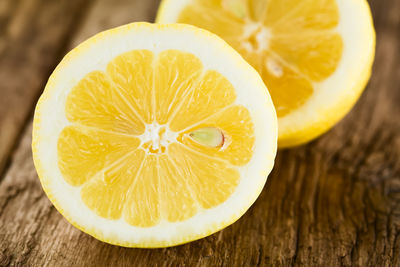 Close-up of lemon slice in plate