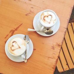 High angle view of coffee cup on table