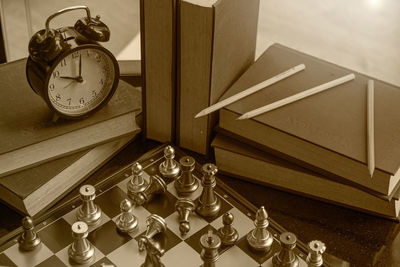 High angle view of clock on table at home