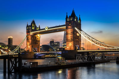 Low angle view of tower bridge over river