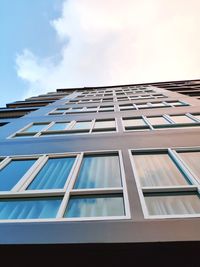 Low angle view of modern building against sky