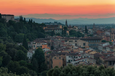 Panorama of the city at twilight, view from piazzale michelange lo residential area and old city. 